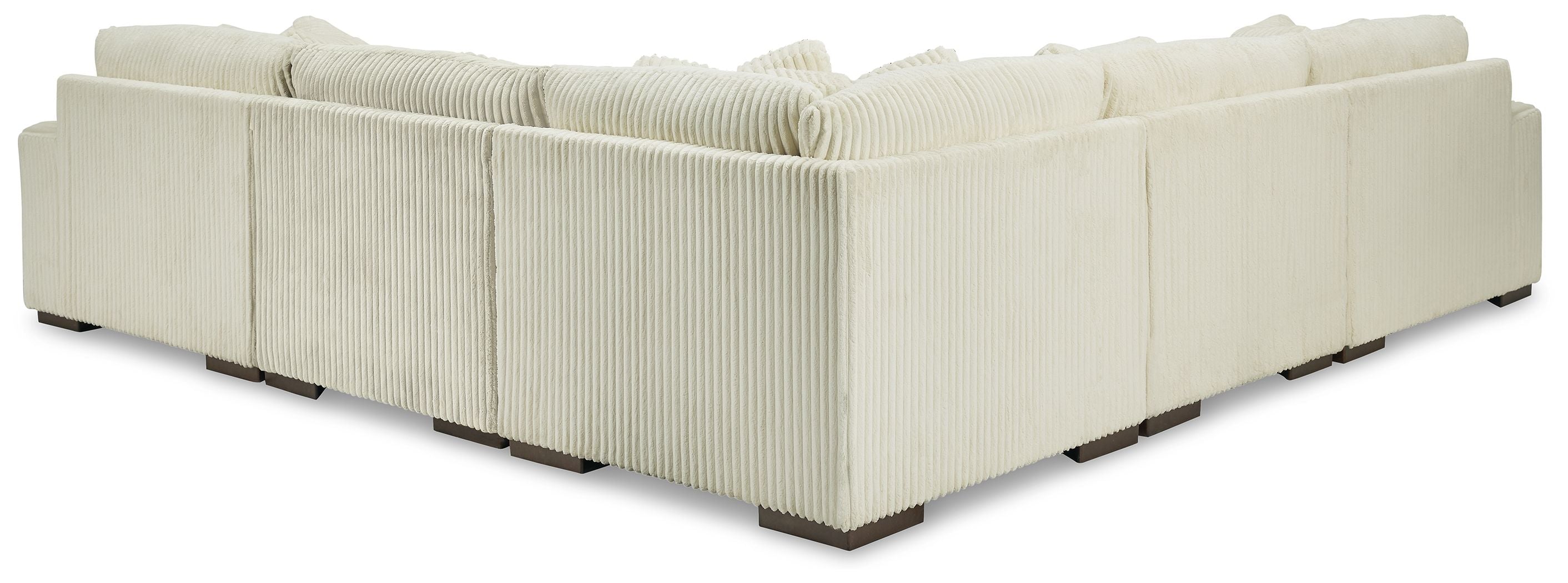 Sectional sofa with chaise end, light ivory ribbed upholstery and thick seat cushions