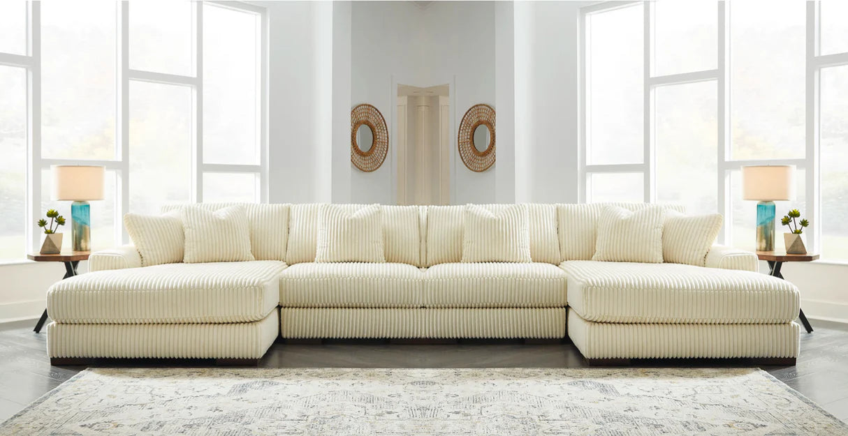 Ivory sectional sofa with chaise and ribbed cord upholstery, low back cushions