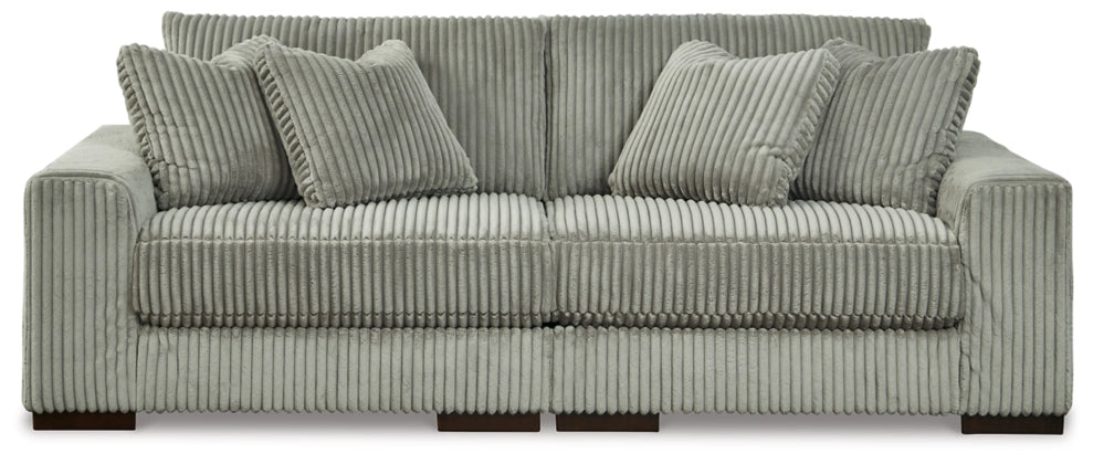 Sectional sofa with tufted back cushions, ribbed striped upholstery in light gray-green