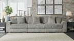 Sectional sofa with chaise, ribbed striped upholstery in light gray-green, square ottoman