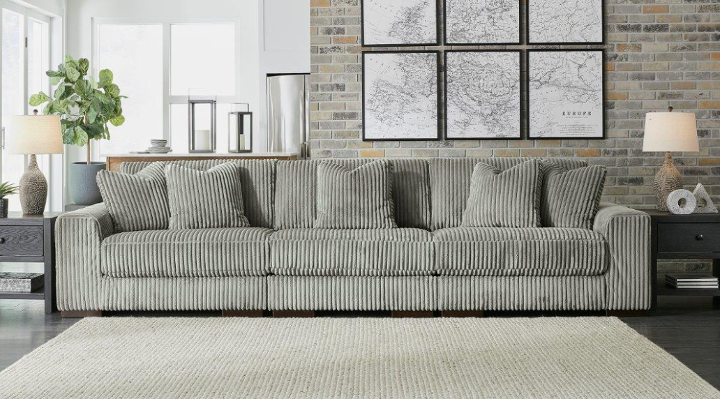 Sectional sofa with chaise, ribbed striped upholstery in light gray-green, square ottoman