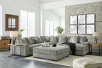 Sectional sofa with chaise, ribbed striped upholstery in light gray-green, ottoman