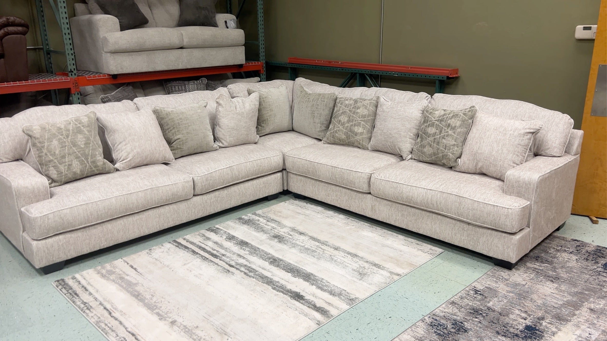 Parchment fabric sectional sofa with tufted back cushions and square arms