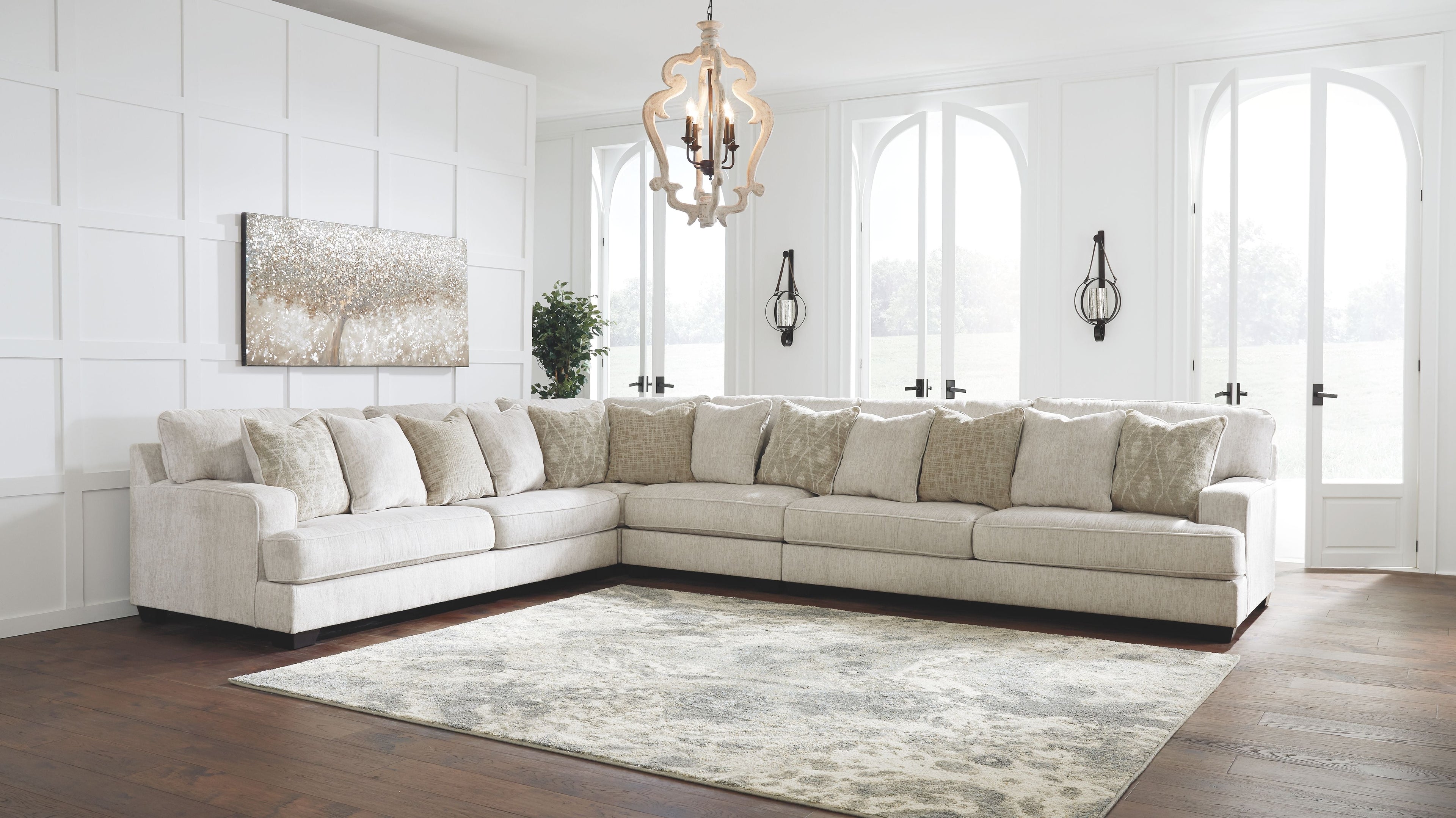Cream sectional sofa with multi-cushion back and low profile arms