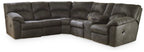 Pewter reclining sectional sofa with cushioned arms and tufted back