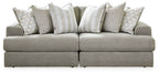 Gray sectional sofa with chaise and patterned striped accent pillows