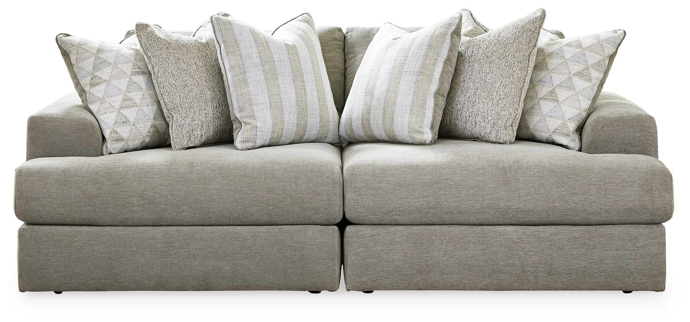 Gray sectional sofa with chaise and patterned striped accent pillows