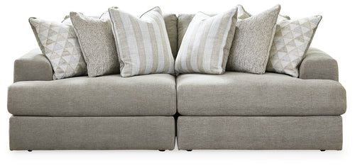 Gray sectional sofa with chaise and patterned striped accent pillows