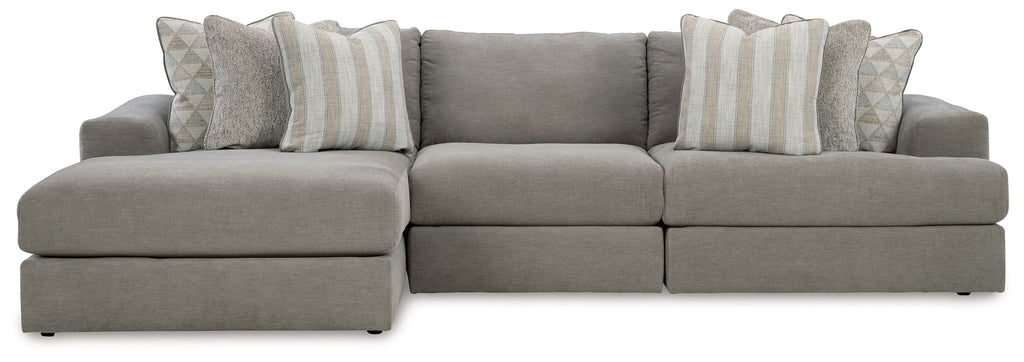 Gray sectional sofa with chaise and striped lumbar pillows