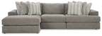 Gray sectional sofa with chaise and striped lumbar pillows