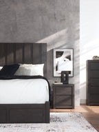 Dark gray two-drawer nightstand with rectangular drawer fronts and flat top