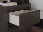 Dark gray nightstand with one drawer open showing light interior