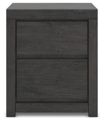 Dark gray two-drawer nightstand with stacked drawer fronts and recessed pulls