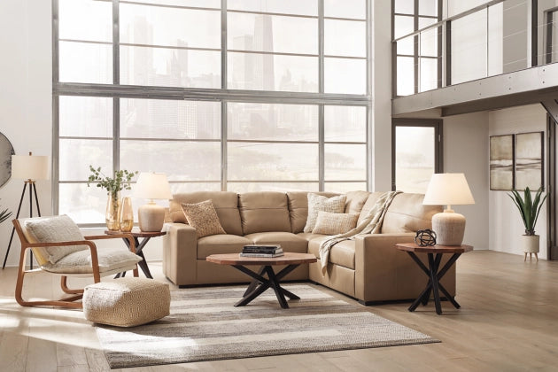 Two-tone sectional sofa with track-style arms and tufted back, tan and cream upholstery
