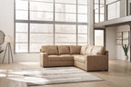 Two-tone sectional sofa with tufted back and wide arms, tan-and-cream upholstery