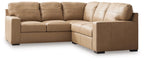 Two-tone upholstered sectional sofa with square arms and cushioned seating in tan and cream