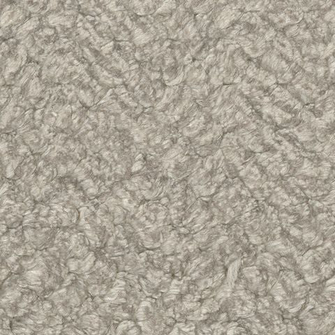 Light beige upholstery fabric close-up with tight textured pattern