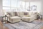 Corner chaise sectional sofa, light beige upholstery with tufted seat cushions and throw pillows