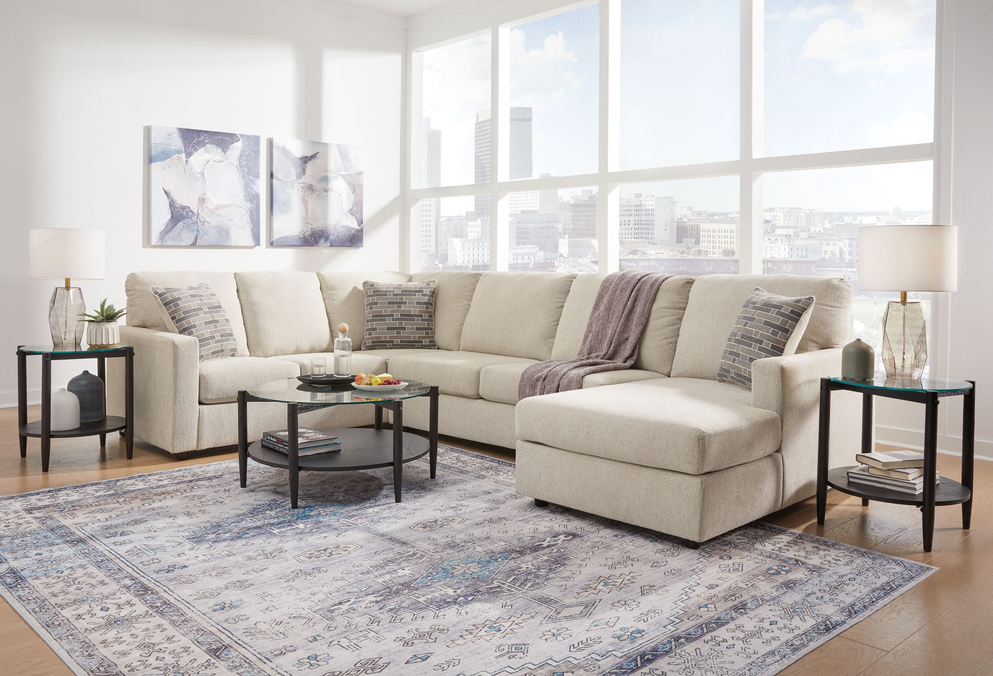 Sectional sofa with corner chaise, light beige upholstery, deep seat cushions, with pillows