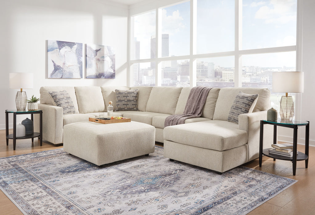 Sectional sofa with corner chaise, light beige fabric, wide arms, with back and side pillows