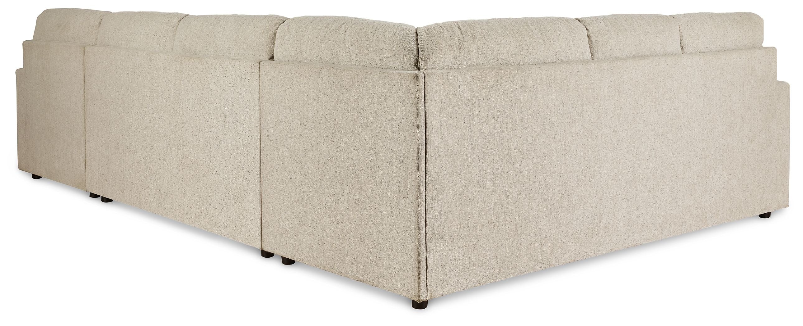 Sectional sofa with chaise-style corner, light beige upholstery, boxed cushions and arms