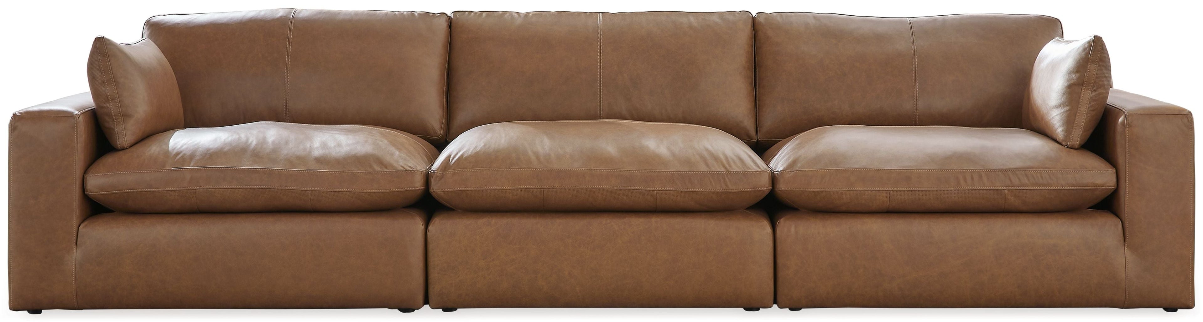 Brown sectional sofa with three wide seats and back cushions