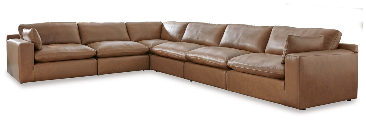 Brown leather sectional sofa L-shaped with padded armrests