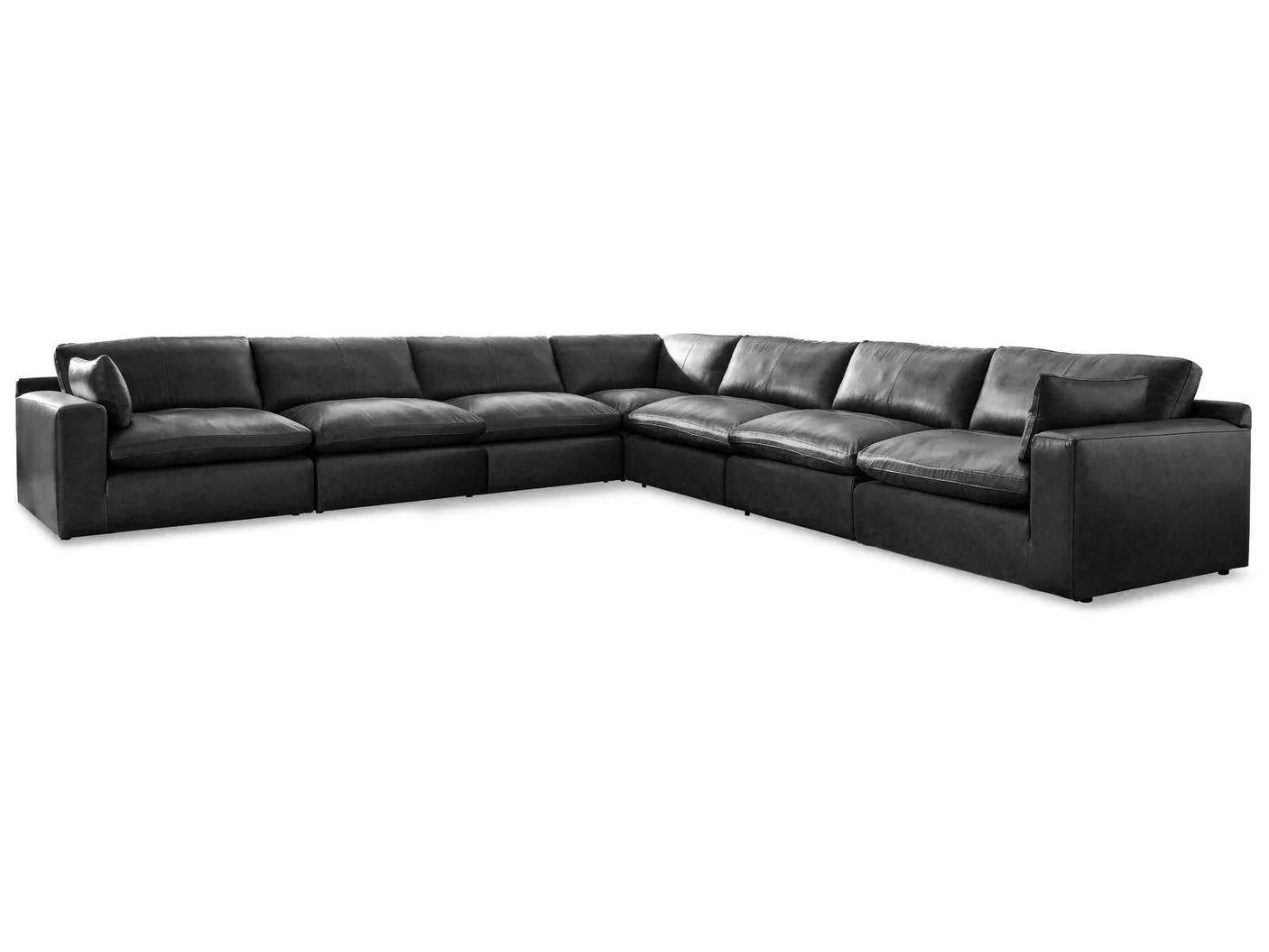 Black sectional sofa with corner chaise, deep cushions, and low track arms