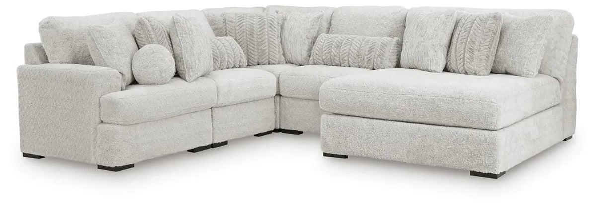 Light gray fabric sectional sofa with chaise, corner L-shape and round accent pillows