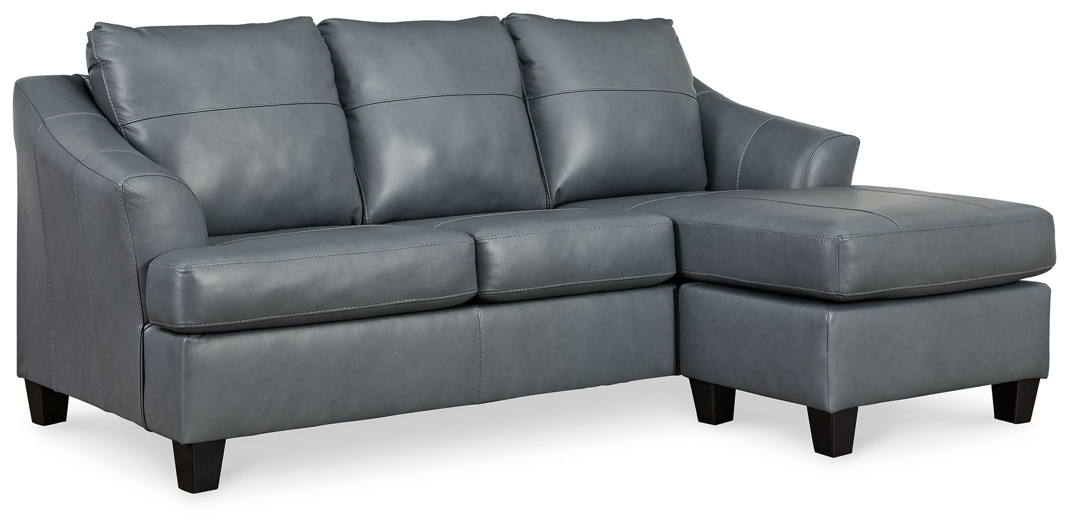 Steel sectional sofa with chaise end, three seat cushions, and stitched back cushions