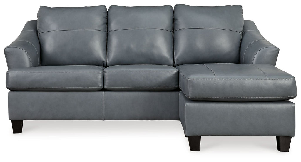 Steel sectional sofa with three seat cushions and padded armrests, gray upholstery