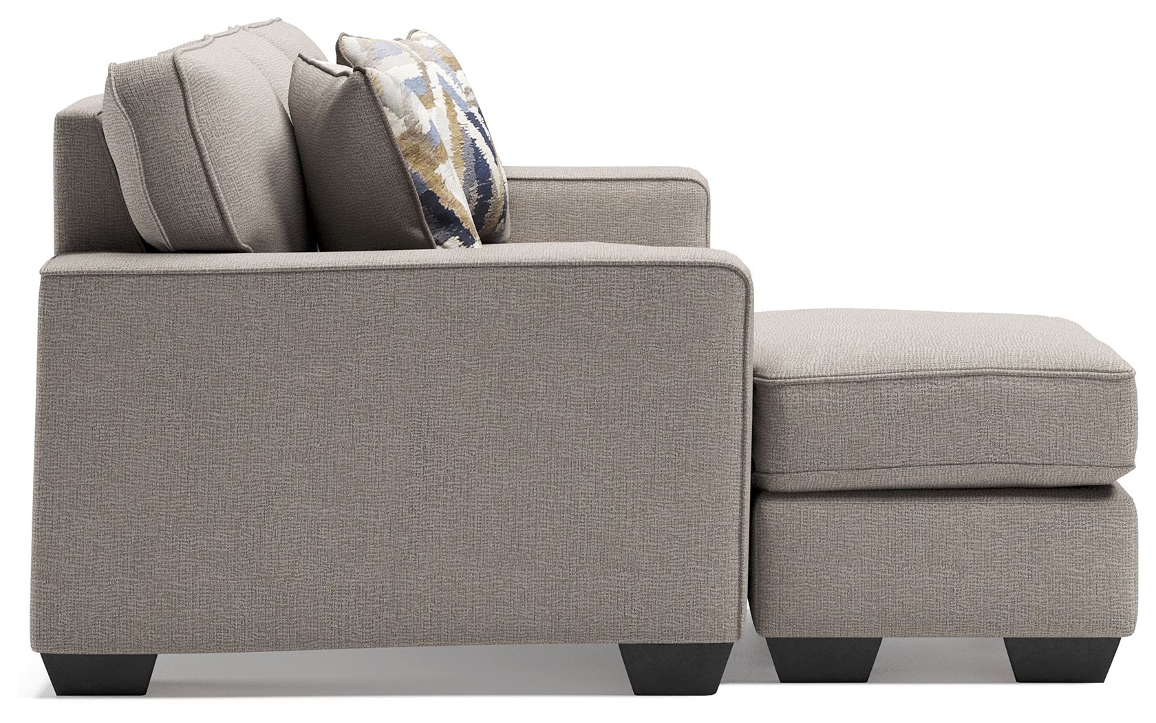 Stone gray sectional sofa corner chaise with thick armrests and patterned pillows
