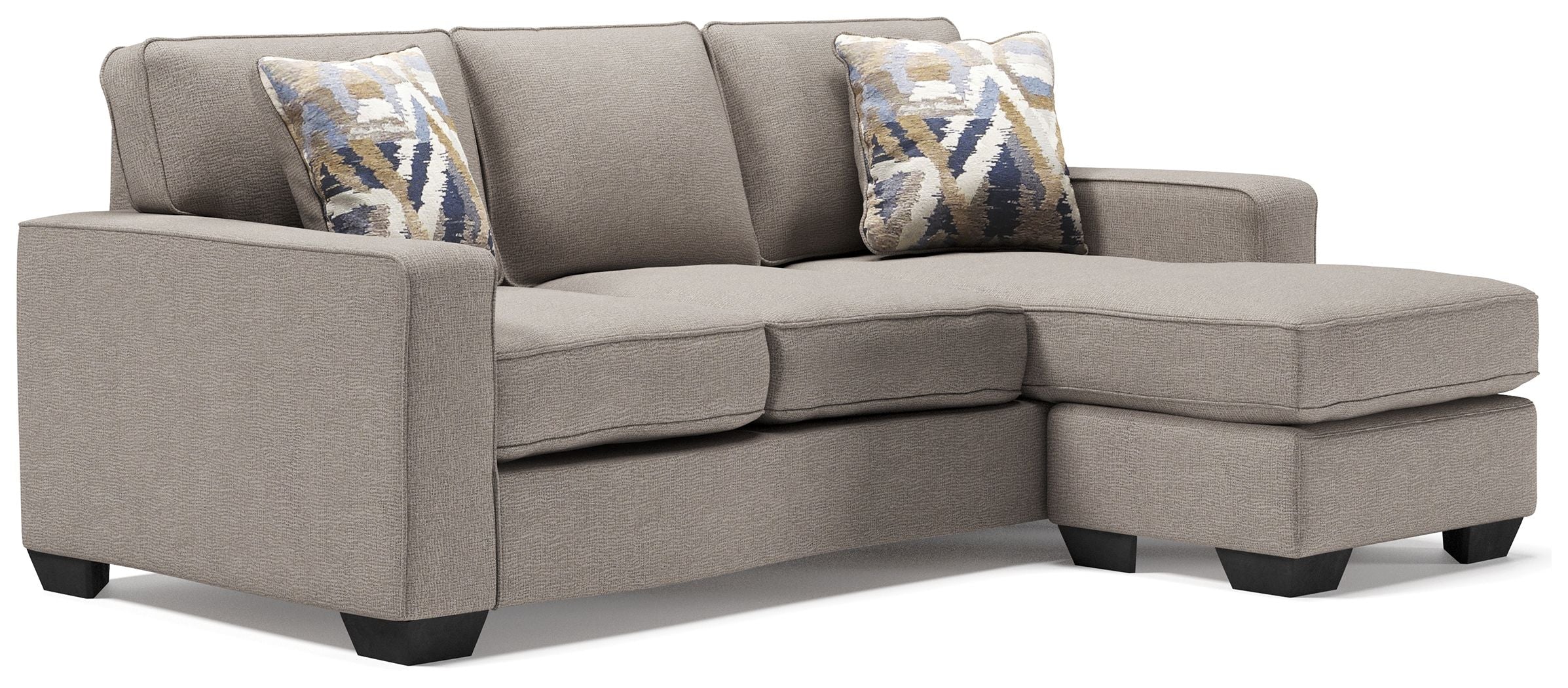 Stone gray L-shaped sectional sofa with three seats and two patterned accent pillows