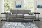 Charcoal sectional sofa with chaise, rounded arms and tufted cushions