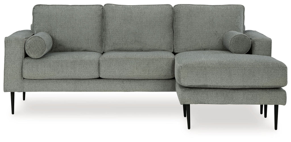 Charcoal sectional sofa with chaise, rounded arms, and tufted back cushions