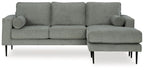 Charcoal sectional sofa with chaise, rounded arms, and tufted back cushions