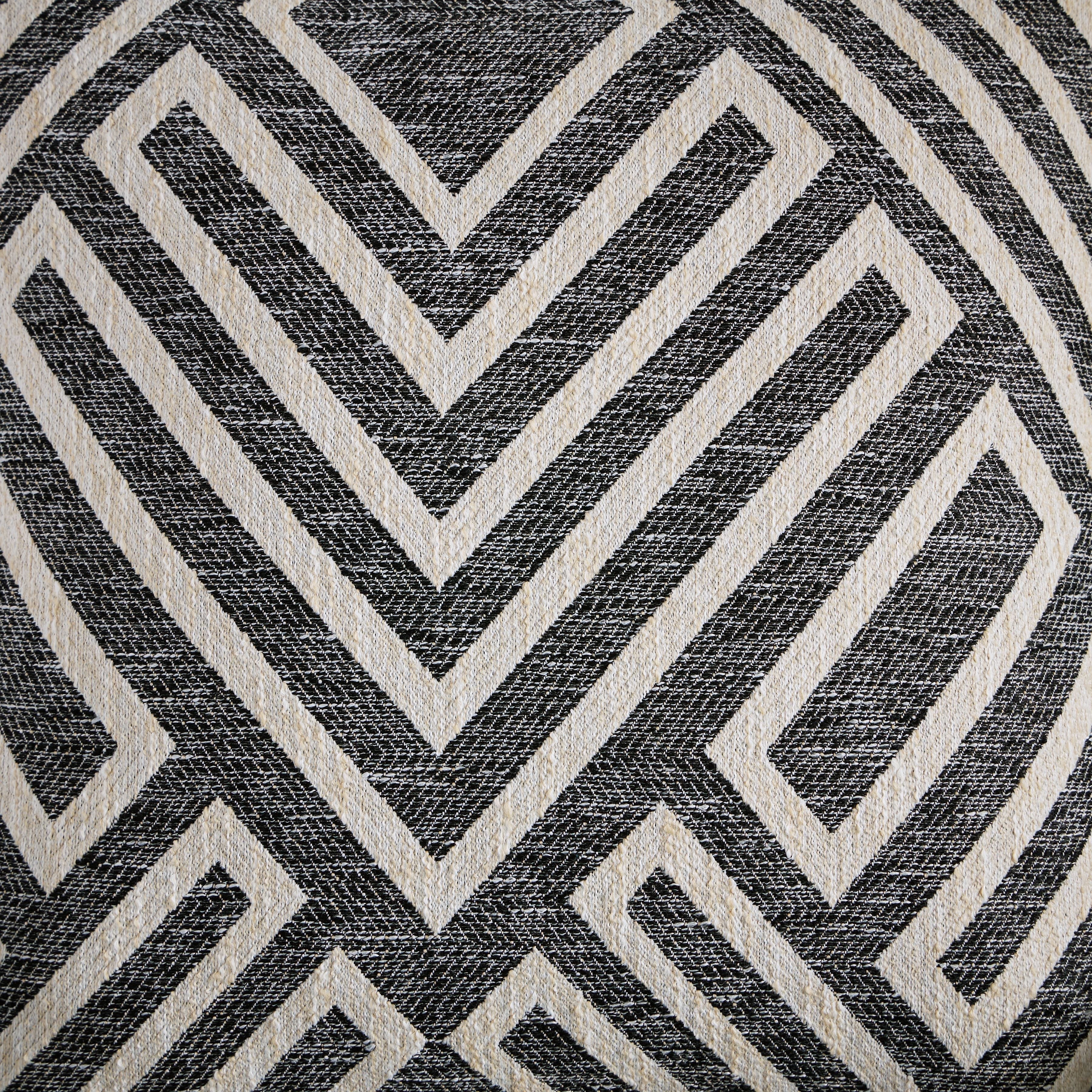 Chevron patterned accent pillow cover in dark and light tones, woven textured fabric