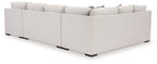 Stone sectional sofa back view with chaise, light upholstery and black feet