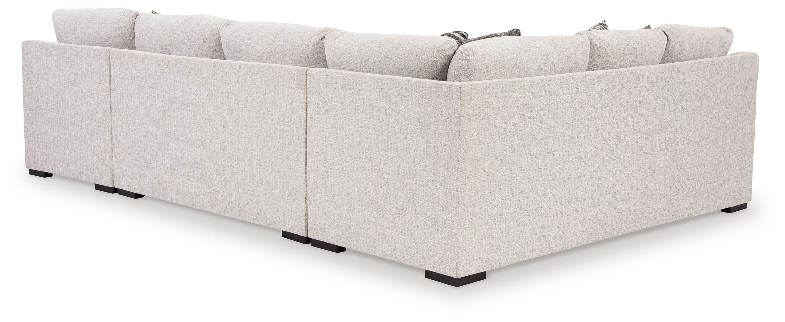 Stone sectional sofa back view with chaise, light upholstery and black feet