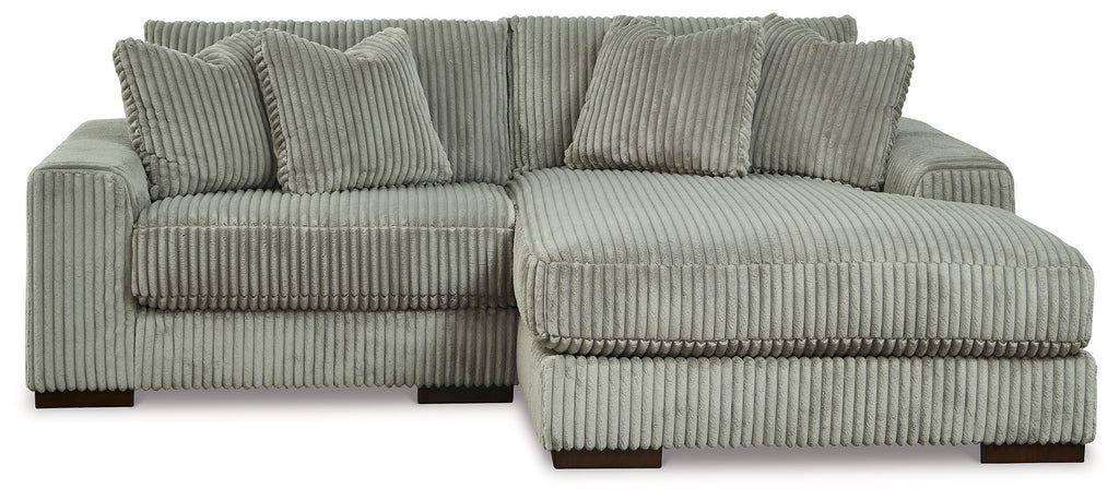 Fog striped sectional sofa with chaise extension and two back throw pillows