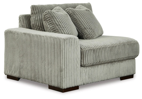 Fog striped sectional sofa with chaise seat and two layered back throw pillows