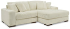Ivory striped sectional sofa with track arms and tufted seat cushions