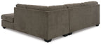 Corner sectional sofa with tufted seat and armrests, dark gray upholstery and black legs
