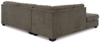 Sectional sofa with tufted back and arms, dark gray fabric, corner chaise with black legs