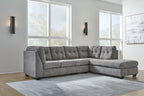 Gray corner chaise sectional sofa with tufted back and chaise lounge section