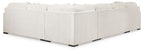 Ivory fabric sectional sofa with boxy arms, square black feet, tight back cushions