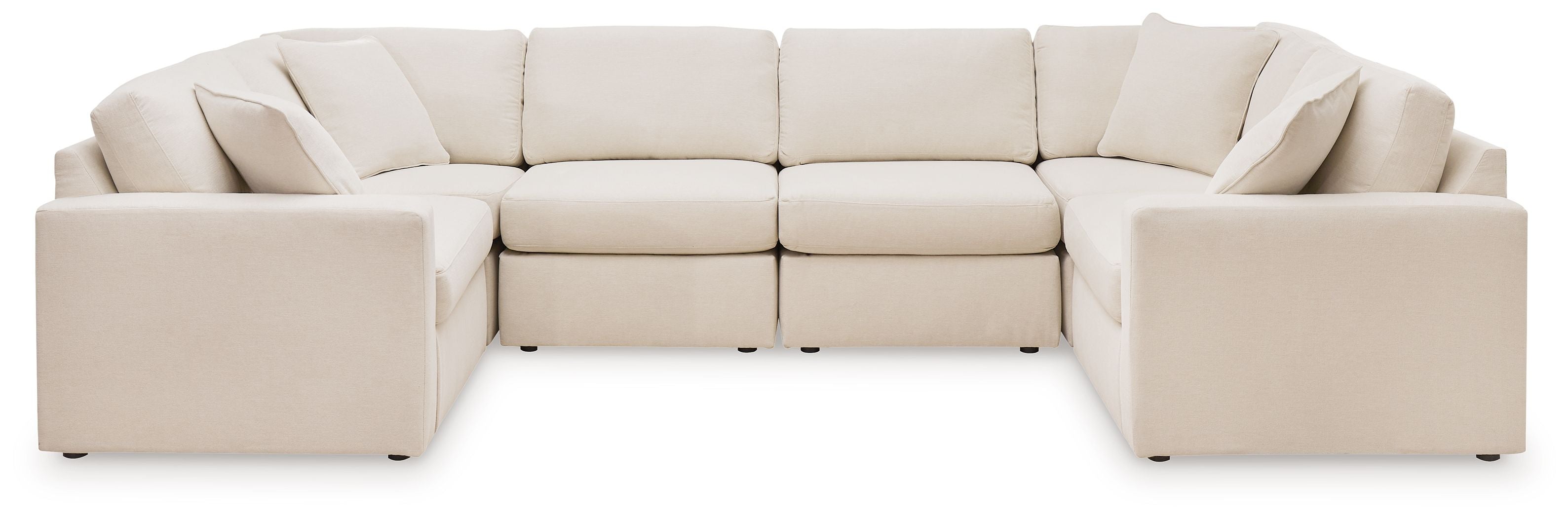Light beige modular U-shaped sectional sofa with cushioned backs and chaise armrests
