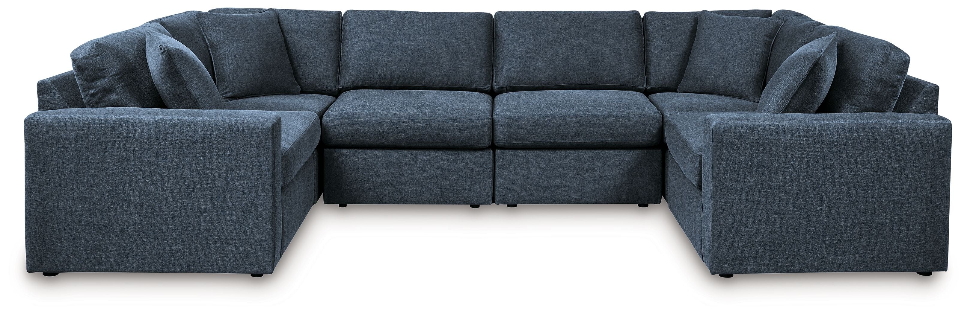 Dark blue modular U-shaped sectional sofa with wide cushions and chaise armrests