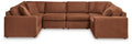 Brown modular U-shaped sectional sofa with cushioned backs and chaise armrests