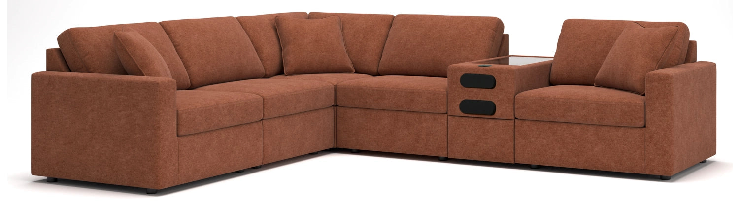 Modular sectional sofa in rust brown fabric with corner chaise and wide seat cushions
